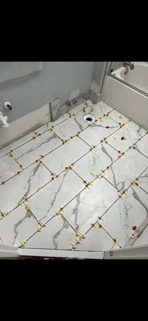 Tile setting and leveling — In progress