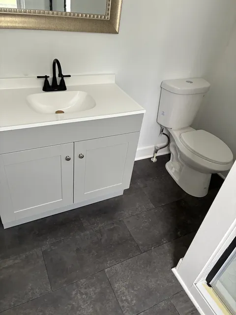 Vanity, fixtures and tile — Finished surfaces