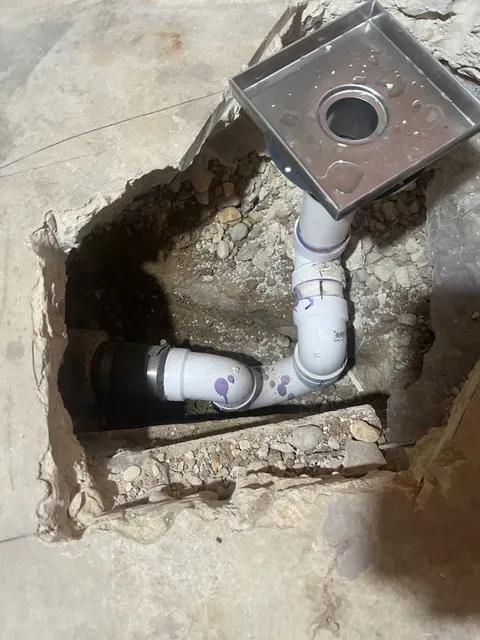 Shower drain installation — In progress