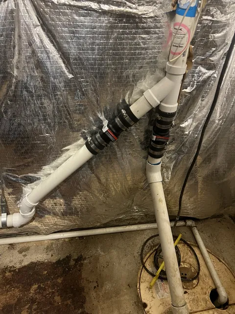 Drain piping inside an open wall — In progress